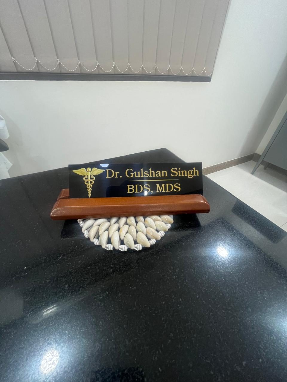 Dr. Gulshan Singh, BDS, MDS nameplate